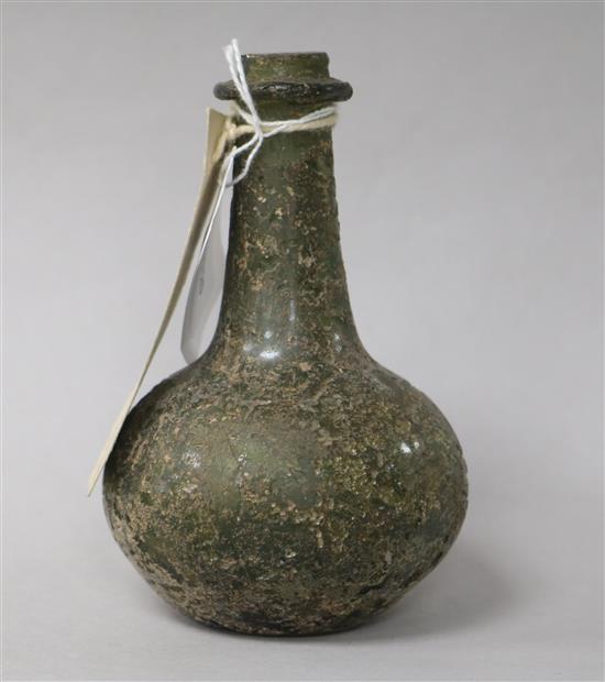 A Roman green glass bottle, of globular form with long narrow neck H 13cm